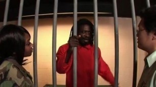 Asian guy eletrocutes prisoner, makes him fuck black guard